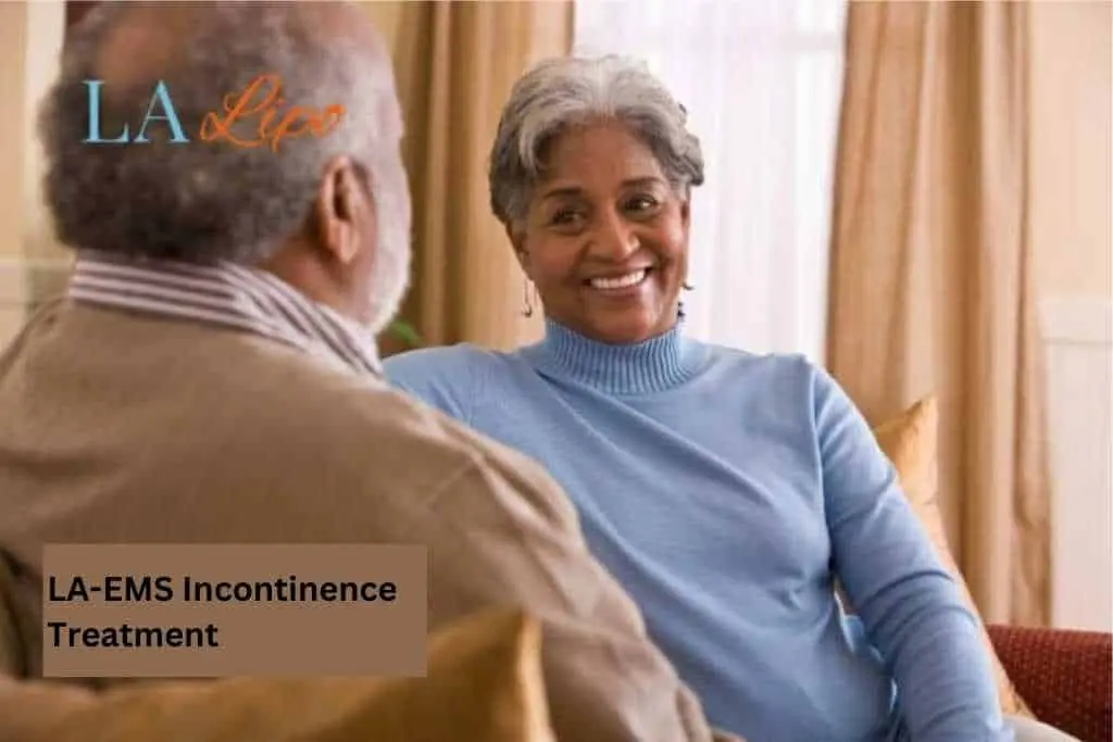 Couple sat smiling at each other - LA-EMS treatment Croydon